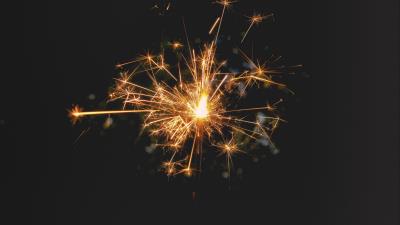 Bengal fire sparks dark background 4k wallpaper