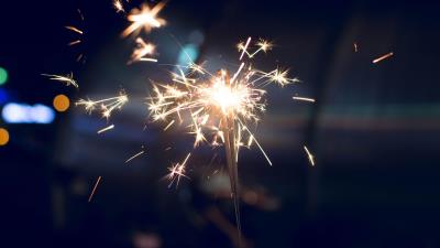 Bengal fire sparks glitter blur dark background 4k wallpaper