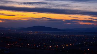 Mountains city lights 4k wallpaper