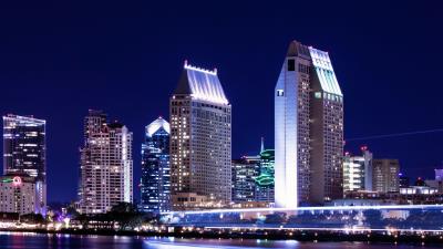 Night city building long exposure 4k wallpaper