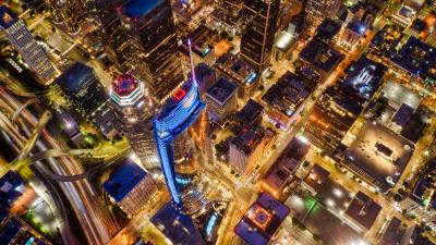 Night city buildings glow 4k wallpaper