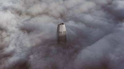 Skyscraper clouds aerial view 4k wallpaper