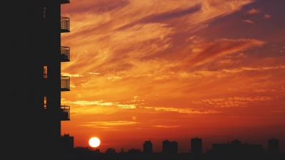 Balcony sunset sky skyline city 4k wallpaper