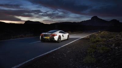 Mclaren 570gt supercar road night rear view 4k wallpaper