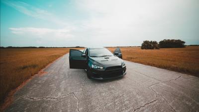 Mitsubishi black front view 4k wallpaper