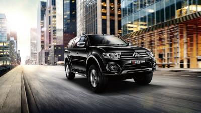 Mitsubishi pajero side view black city motion 4k wallpaper