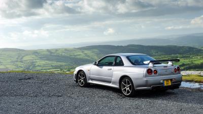 Nissan skyline gt r silver side view 4k wallpaper