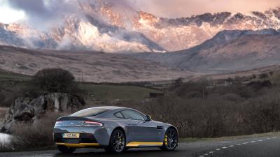 Aston martin v12 vantage s side view mountains 4k wallpaper