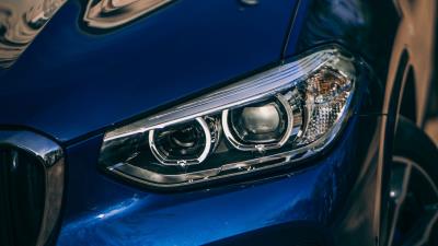Car headlight blue 4k wallpaper