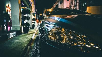 Car headlight evening 4k wallpaper