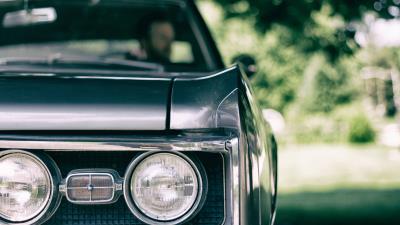 Car headlight front view 4k wallpaper