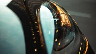 Car headlight reflection 4k wallpaper