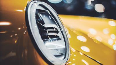 Car yellow headlight 4k wallpaper
