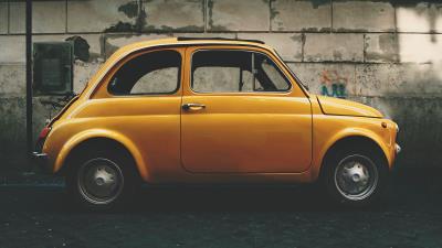 Car yellow side view 4k wallpaper