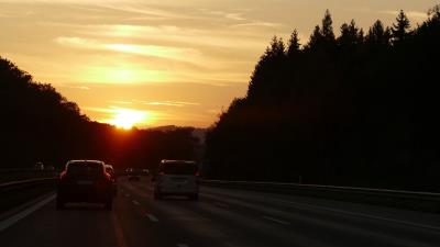 Cars track sunset 4k wallpaper