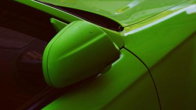 Green car mirror 4k wallpaper