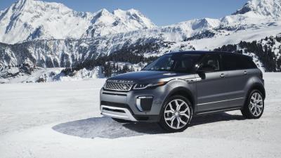 Land rover range rover snow side view 4k wallpaper