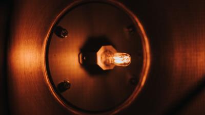 Light bulb glow dark 4k wallpaper