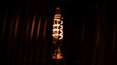 Light bulb spiral light 4k wallpaper