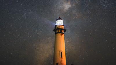 Lighthouse building night 4k wallpaper