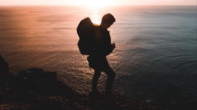 Man sea coast 4k wallpaper