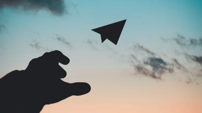 Paper airplane hand sky 4k wallpaper