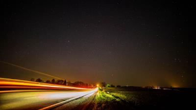 Road long exposure starry sky 4k wallpaper