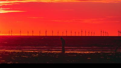 Silhouette wind turbines sunset 4k wallpaper