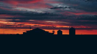 Sky sunset building cloudy clouds 4k wallpaper