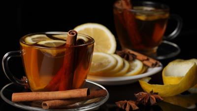 Tea cup cinnamon lemon black background 4k wallpaper