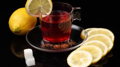 Tea lemon black background sugar 4k wallpaper