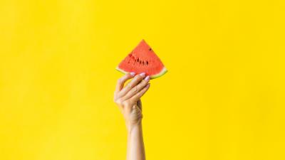 Watermelon hand yellow 4k wallpaper