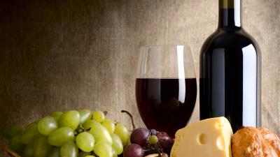 Wine cheese grapes sausage pastries composition 4k wallpaper