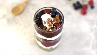 Yogurt raspberries blueberries blackberries nuts chocolate 4k wallpaper