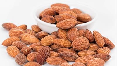 Almonds walnuts roasted saucer 4k wallpaper