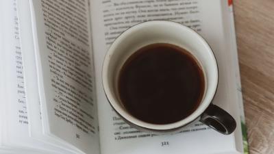 Book cup flowers 4k wallpaper