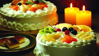 Cakes steam fruit candles biscuits composition 4k wallpaper