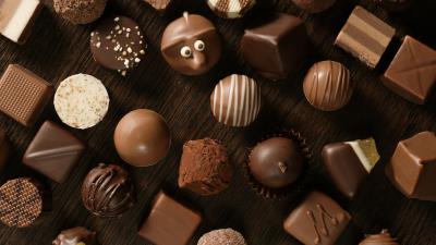 Chocolate candies table allsorts eyes 4k wallpaper