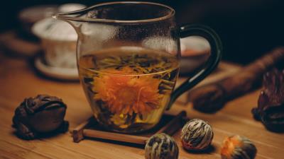 Flowering tea bud cup tea party 4k wallpaper