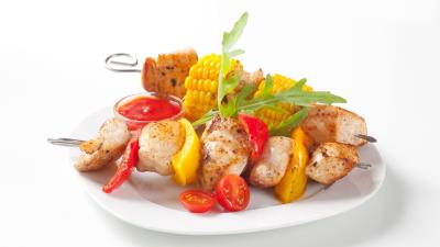 Kebabs dishes vegetables corn plate white background 4k wallpaper