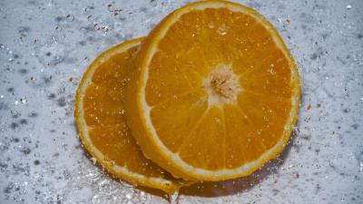 Orange drops sprays 4k wallpaper