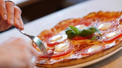 Pizza pastries tomatoes cheese hand 4k wallpaper