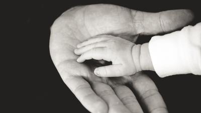 Child parents hands caring tenderness family bw 4k wallpaper