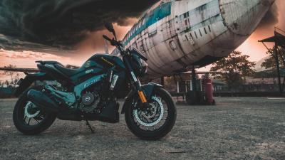Motorcycle airplane side view 4k wallpaper