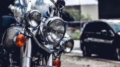Motorcycle headlight front view 4k wallpaper