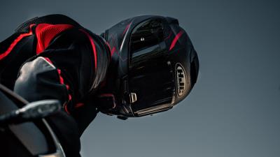 Motorcyclist helmet motorcycle wall 4k wallpaper