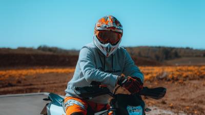 Motorcyclist motorcycle helmet wall 4k wallpaper