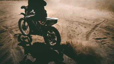 Motorcyclist motorcycle sand 4k wallpaper