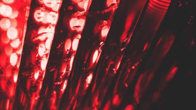 Red glare bokeh 4k wallpaper