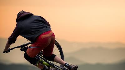 Bicycle cyclist jump 4k wallpaper
